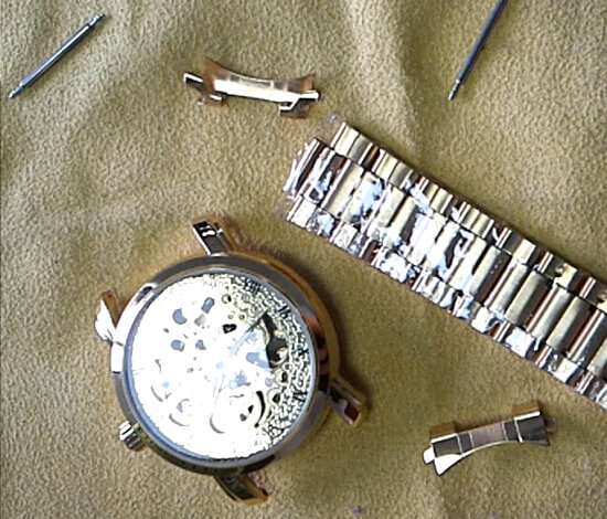 How to put the stainless steel strap back on the watch